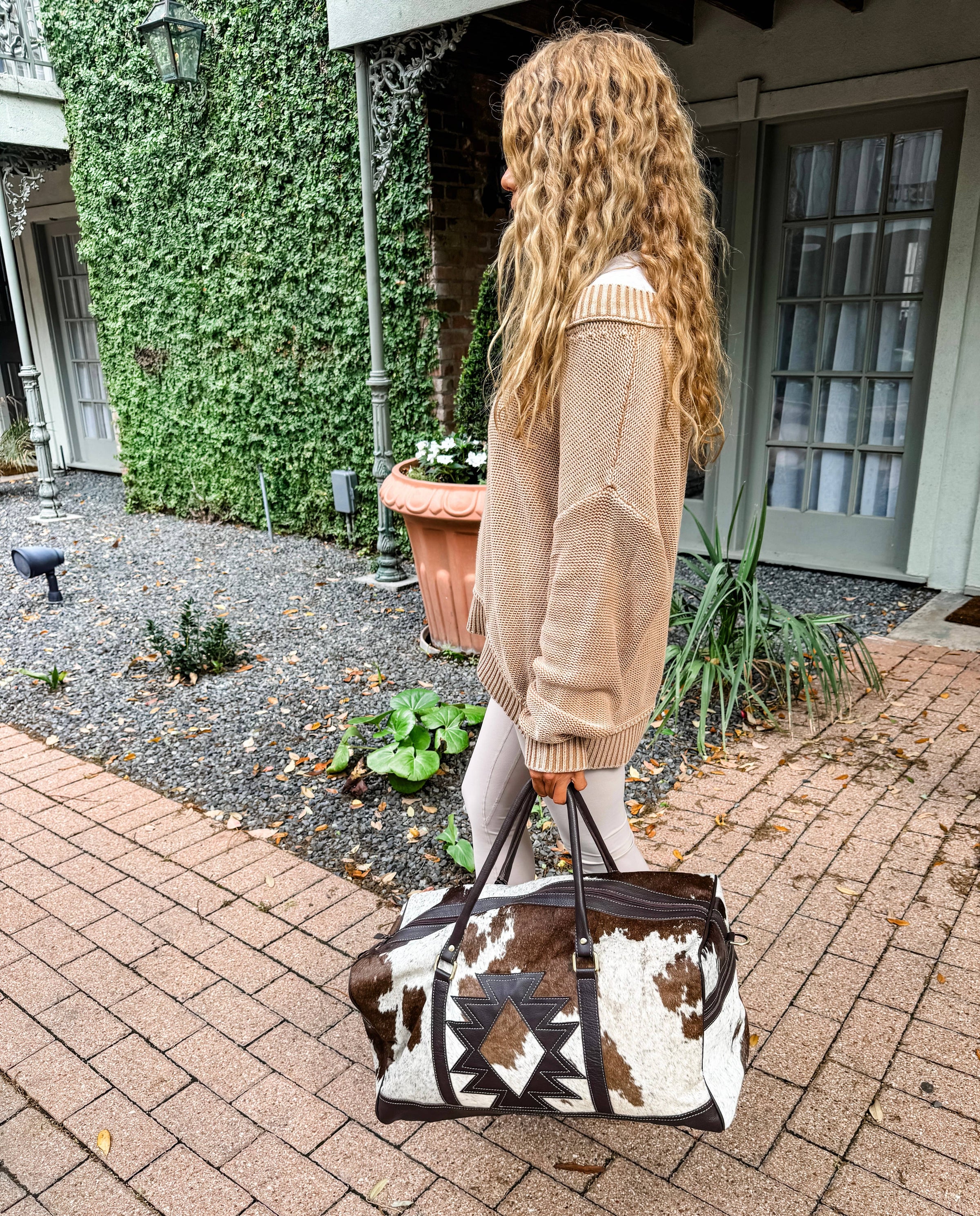 AZTEC TRAVEL DUFFLE leather hair on cowhide travel bag | Evidence Board Co